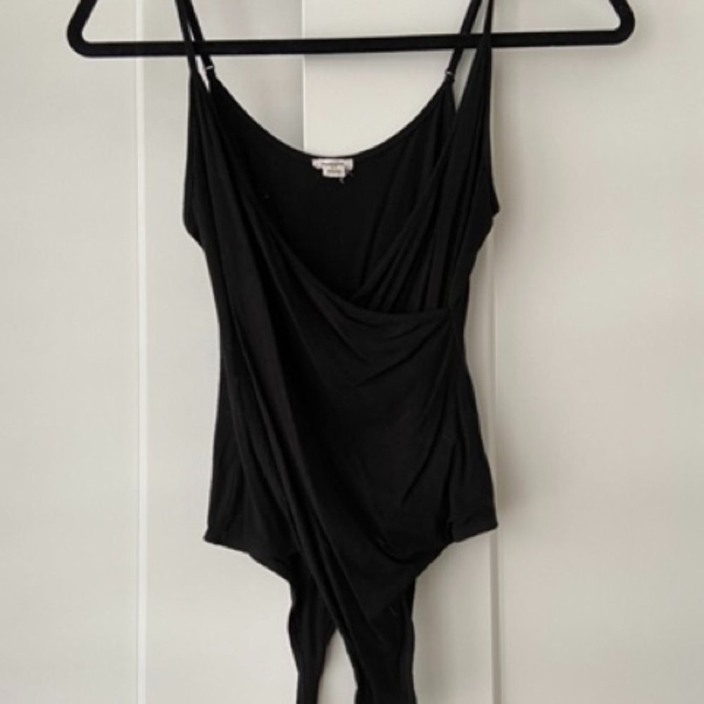 Cross body suit lightly worn